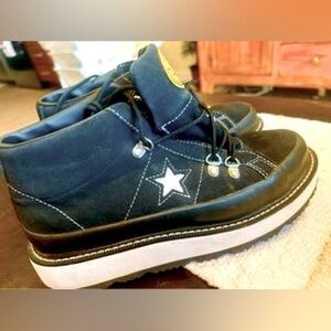 Awesome women’s Converse All Star high top shoes. Size 8